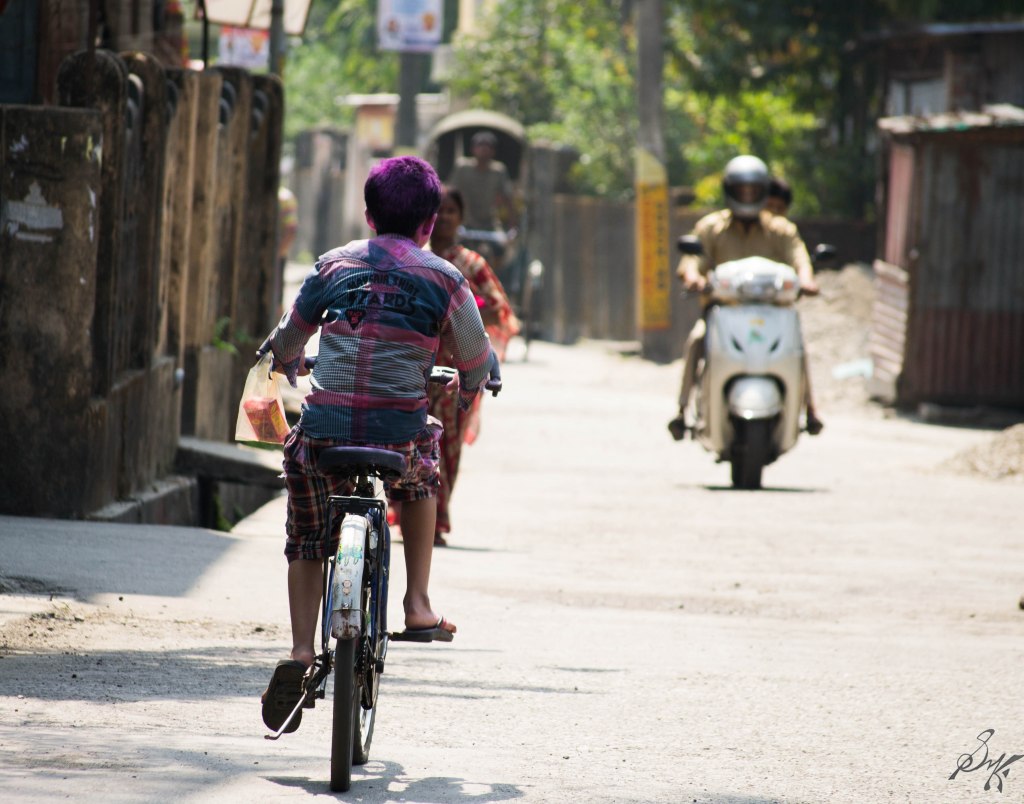 Cycle, Rickshaw and a Scooty, Holi